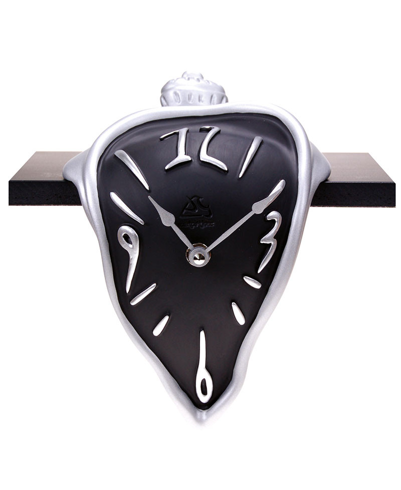 Surrealist style shelf clock, table clock.
German UTS quartz clock mechanism. Antartidee Made in Italy