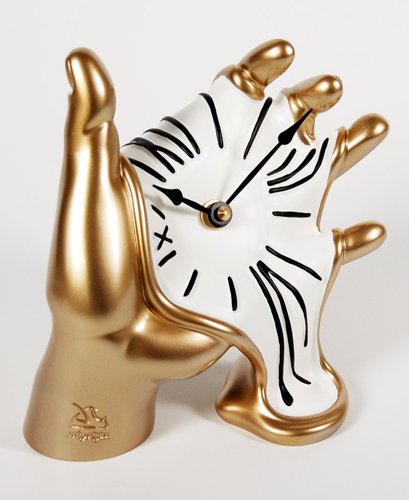 Orologio da tavolo moderno in stile surrealista con mano in resina decorata. Antartidee